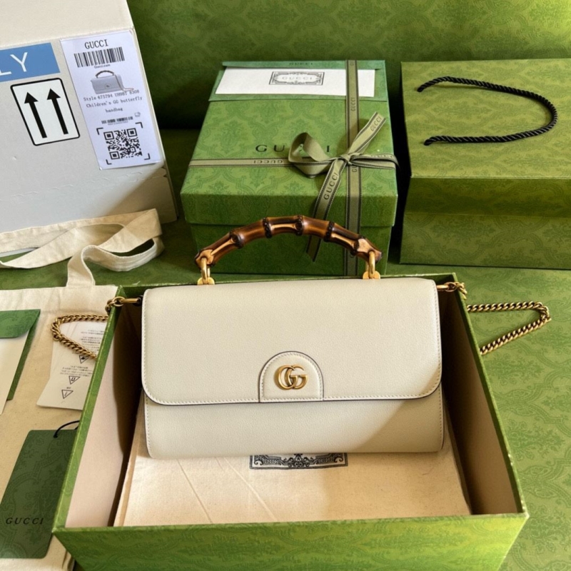 G*u*i top handle bags